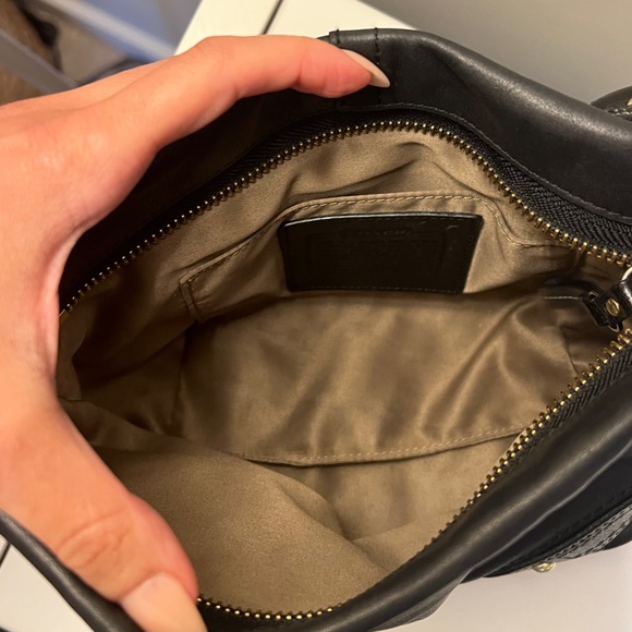 A small leather coach bag. - Picture 4 of 5